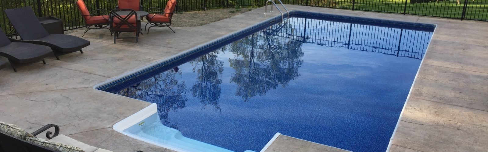 EZ Aqua Pool with Stamped Concrete Deck